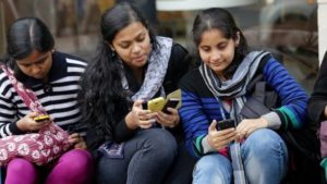 Mobile users in India/photo by BBC