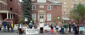 A regular Friday vigil held outside Homewood Friends Meeting in Baltimore 