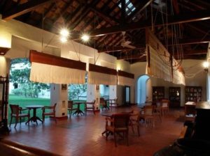 Restored punka fans cool the large public veranda on the ground floor at Brunton Boatyard